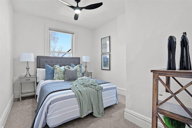 bedroom with carpet flooring, a ceiling fan, and baseboards