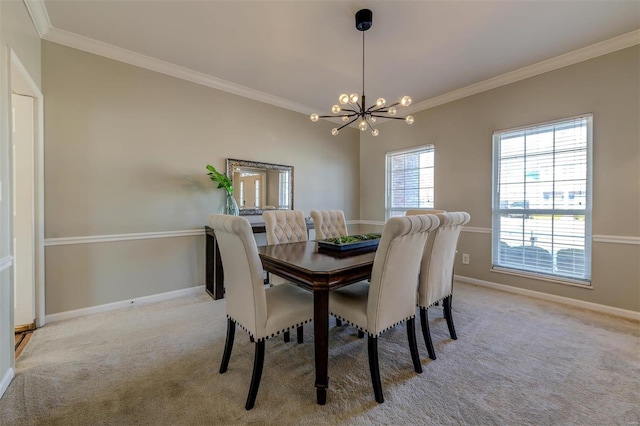 carpeted dining space featuring ornamental molding, a notable chandelier, and baseboards