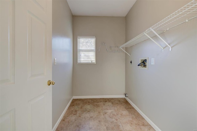 laundry area featuring laundry area, hookup for a washing machine, baseboards, and hookup for an electric dryer