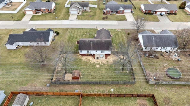 birds eye view of property with a residential view