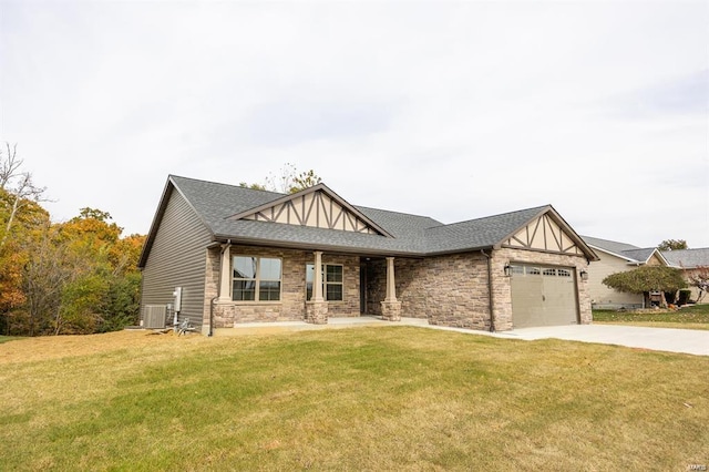 view of front of home with a front yard, an attached garage, driveway, and roof with shingles