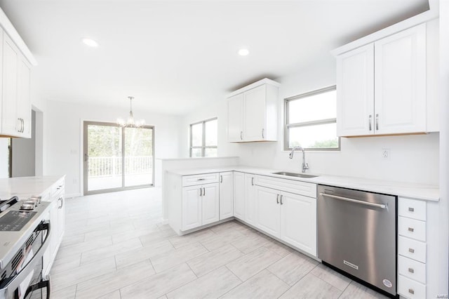 kitchen featuring a sink, white cabinets, and stainless steel appliances