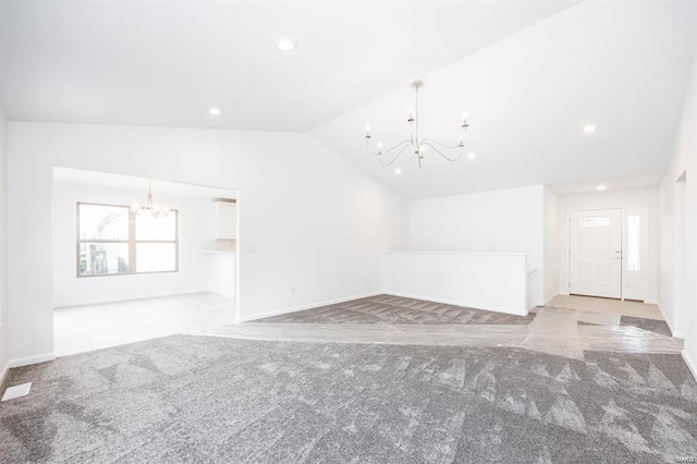 interior space with recessed lighting, carpet floors, a notable chandelier, and lofted ceiling