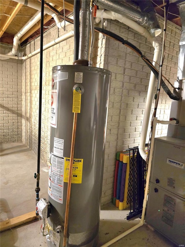 utility room with gas water heater