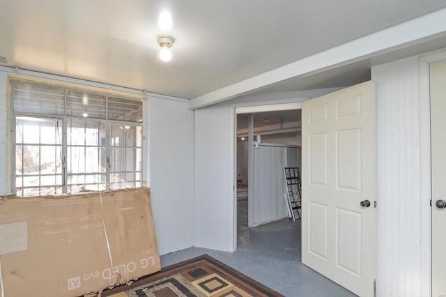 interior space featuring concrete flooring