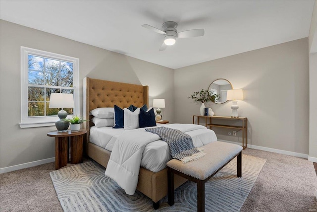 bedroom featuring carpet, baseboards, and a ceiling fan