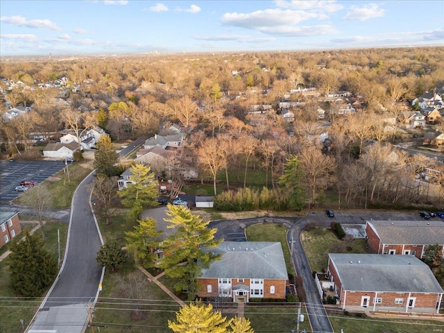 bird's eye view featuring a residential view and a view of trees