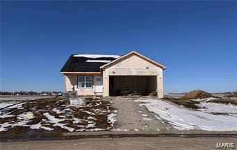 property under construction featuring a garage