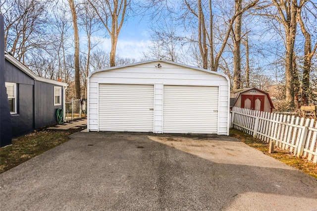 detached garage with fence