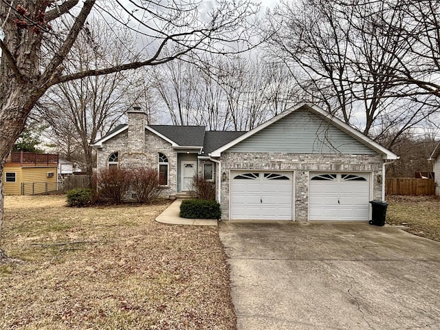 ranch-style home featuring a garage, fence, concrete driveway, roof with shingles, and a chimney