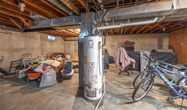 below grade area featuring water heater