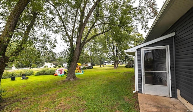 view of yard featuring a playground