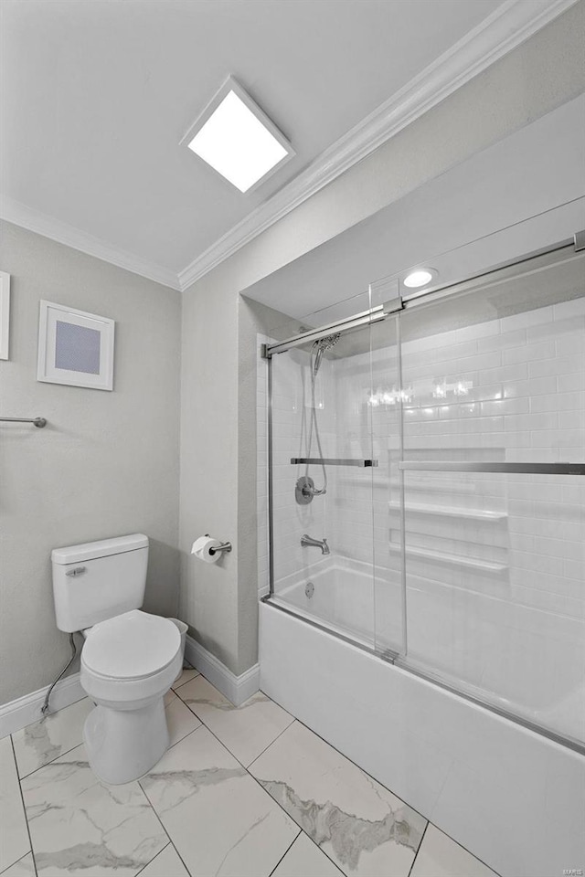 bathroom with ornamental molding, shower / bath combination with glass door, toilet, and baseboards