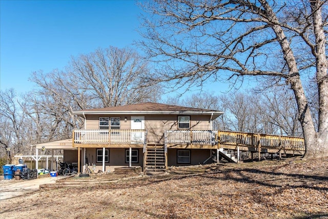 back of house with a deck and stairway