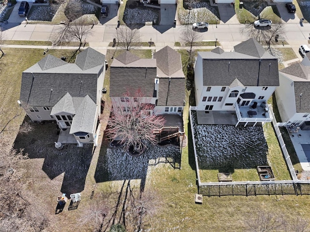 birds eye view of property with a residential view