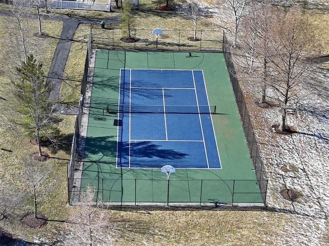 view of sport court with community basketball court and fence