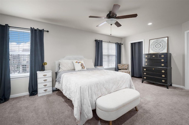 carpeted bedroom featuring a ceiling fan, recessed lighting, and baseboards