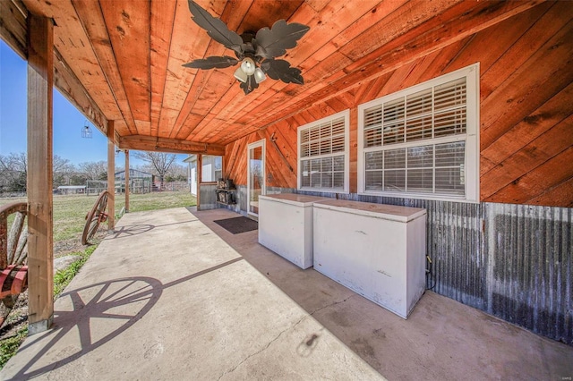 view of patio featuring ceiling fan