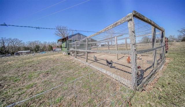 view of yard with an outdoor structure and exterior structure