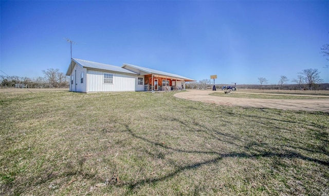 view of yard with covered porch