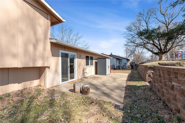 exterior space with fence and a patio