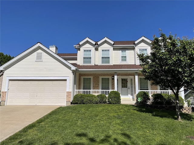 view of front of property with brick siding, a porch, concrete driveway, a front yard, and a garage