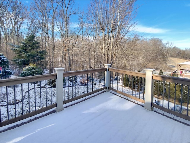 view of snow covered deck