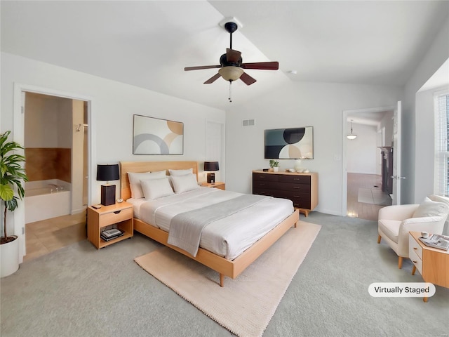 bedroom with vaulted ceiling, ceiling fan, light carpet, and visible vents