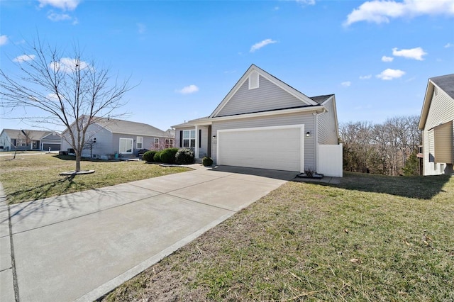 view of front of house with an attached garage, concrete driveway, and a front lawn