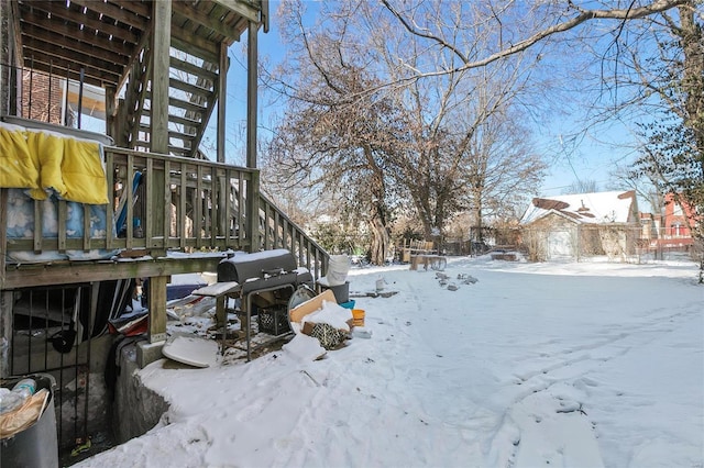 view of yard layered in snow