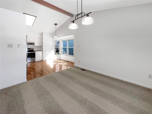 interior space featuring visible vents, wood finished floors, high vaulted ceiling, beamed ceiling, and baseboards