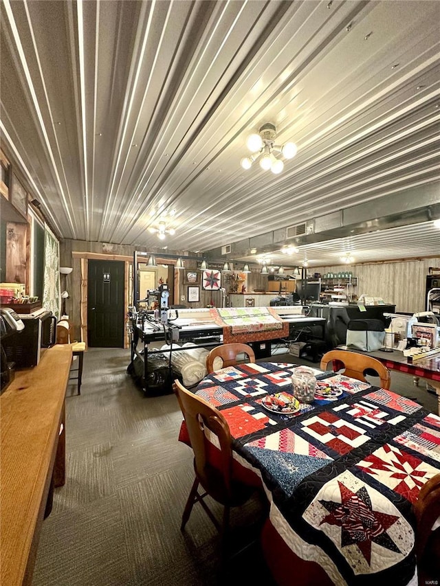 dining space featuring carpet flooring