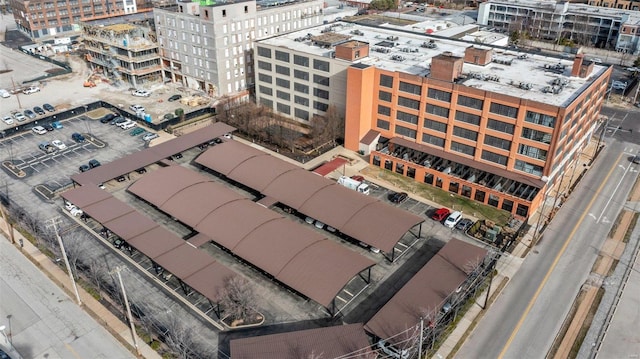 birds eye view of property featuring a city view