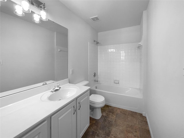 full bathroom with visible vents, vanity, toilet, and tub / shower combination