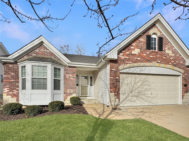 view of front of home featuring an attached garage, a front yard, concrete driveway, and brick siding