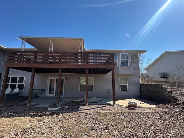 back of house with a patio area, central AC unit, and a deck