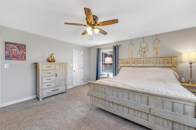 bedroom with baseboards, carpet floors, and a ceiling fan