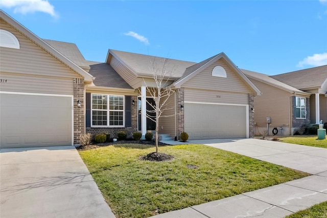 ranch-style house with a garage, a front yard, concrete driveway, and brick siding