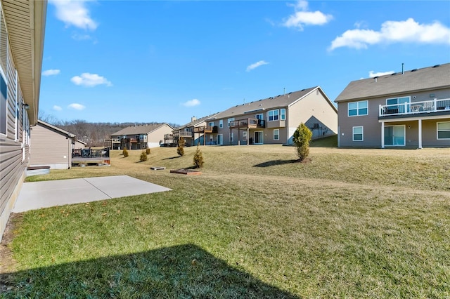 view of yard featuring a residential view