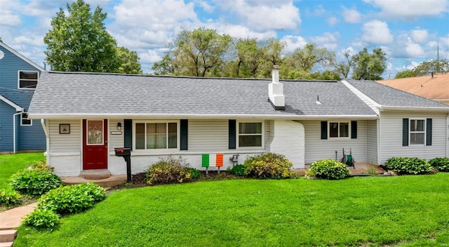 ranch-style home featuring a shingled roof, a porch, and a front lawn