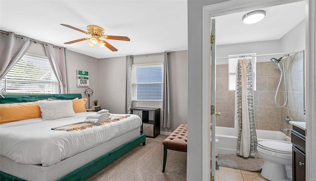 bedroom featuring tile patterned flooring and a ceiling fan