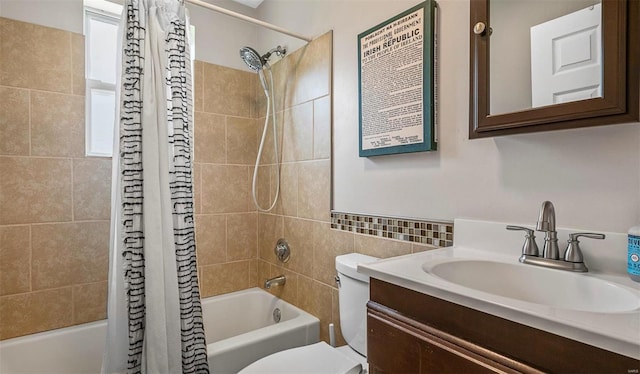 bathroom with shower / tub combo with curtain, tile walls, toilet, and vanity