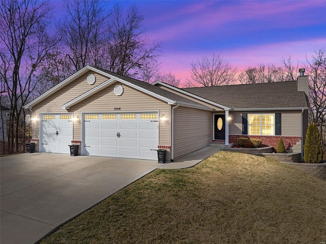 ranch-style home with brick siding, an attached garage, central AC, driveway, and a front lawn