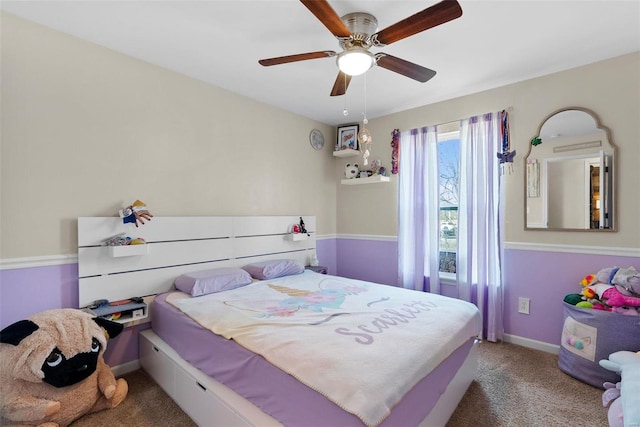 bedroom featuring ceiling fan, carpet flooring, and baseboards