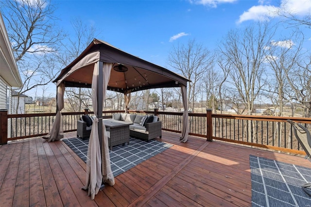 wooden terrace with an outdoor hangout area