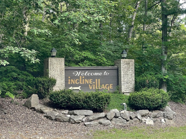 view of community sign