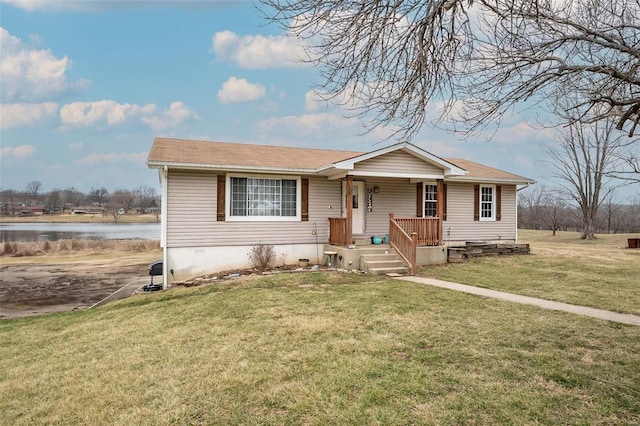 view of front of property featuring a water view, covered porch, and a front yard