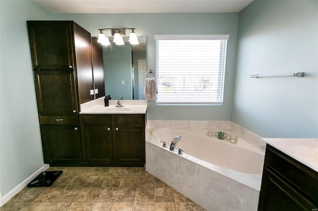 full bathroom featuring a bath, vanity, and tile patterned floors