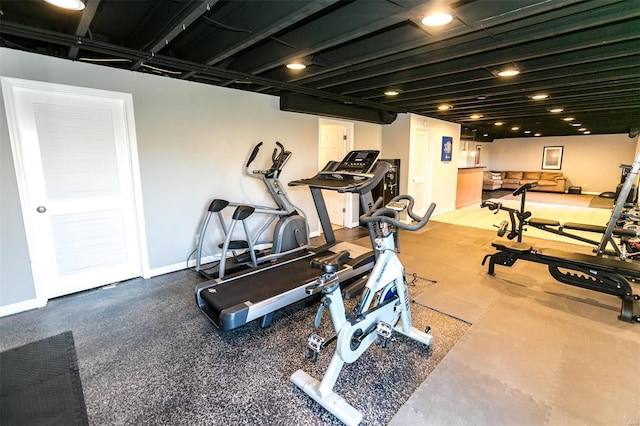 workout area featuring baseboards