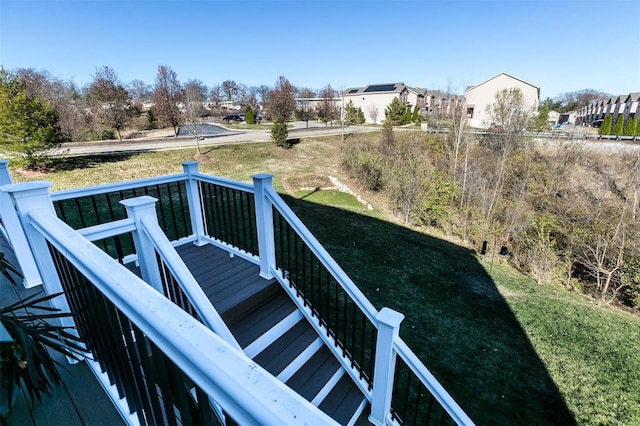 deck featuring a lawn